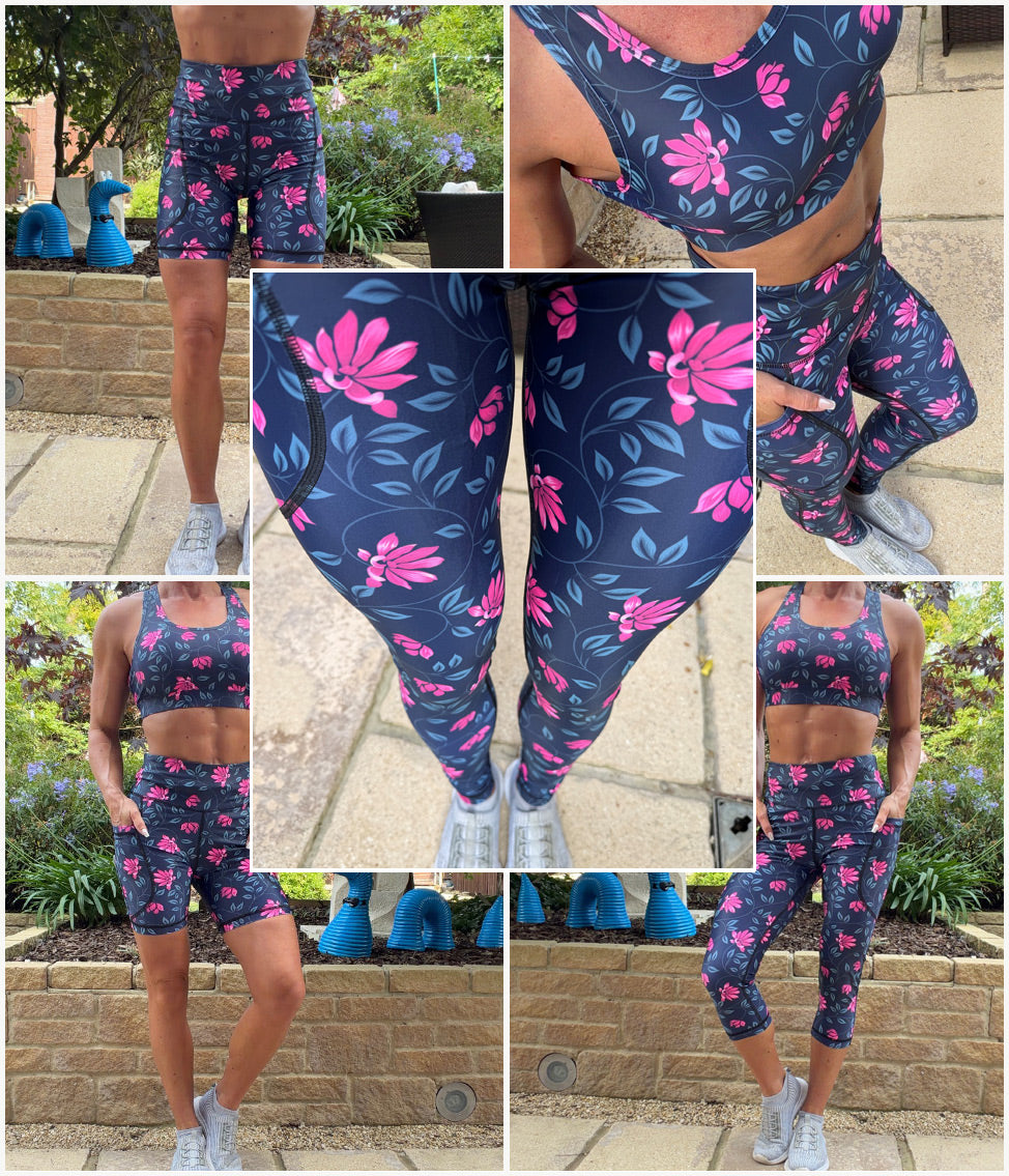 Model wearing Pink Twilight squat proof high waisted leggings with pink floral pattern and deep thigh pockets
