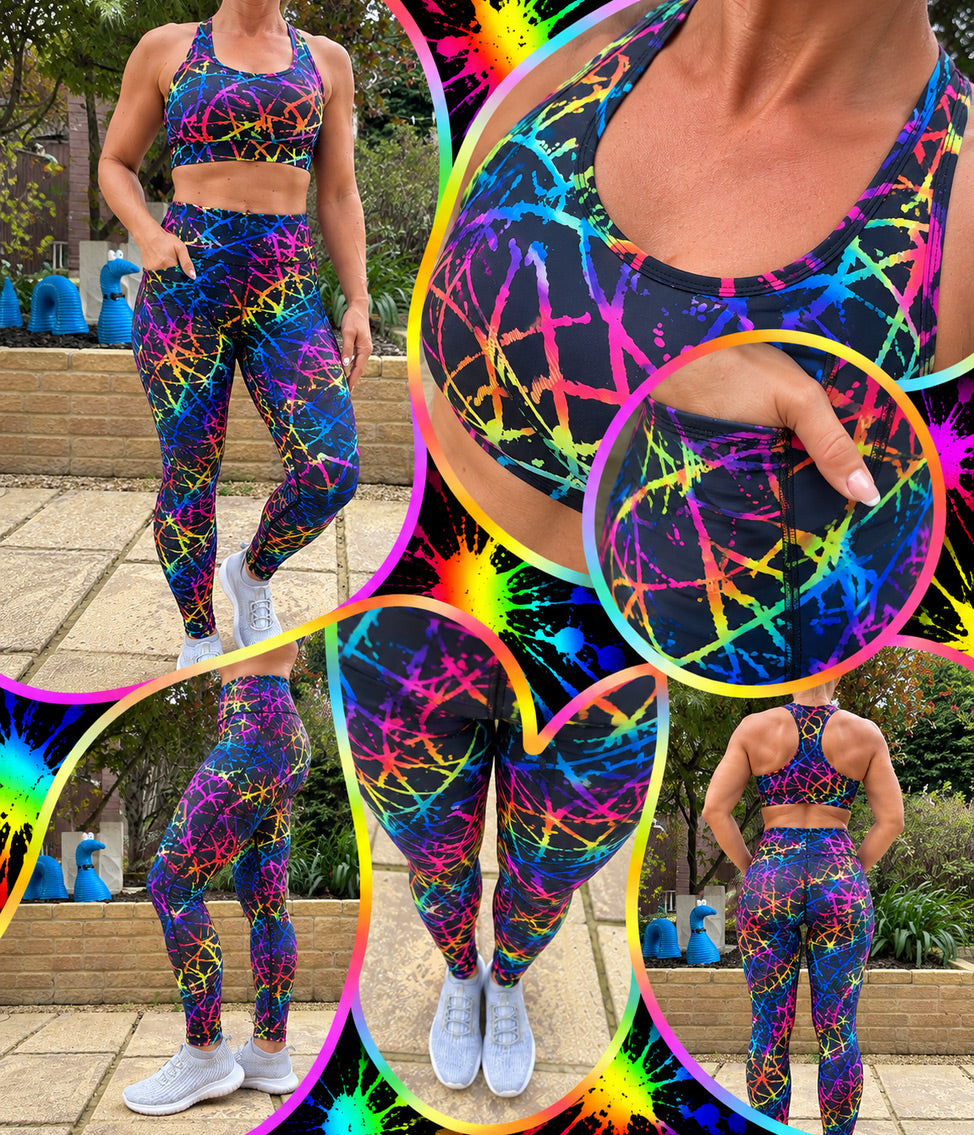 Model wearing Splatter Punk squat proof high waisted leggings with vibrant rainbow splatter print and deep thigh pockets